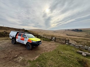 Volunteer rescuers help  vulnerable person