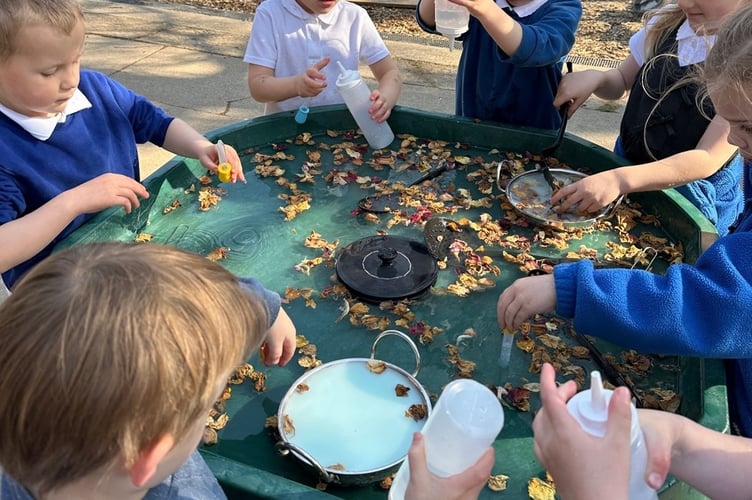 Children make the most of the new outdoor play area at Lifton Community Academy