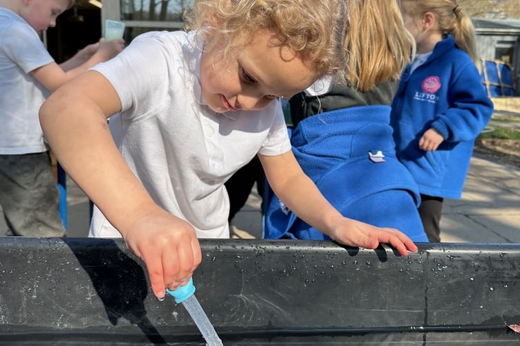 A Lifton pupil enjoys the new outdoor play area.