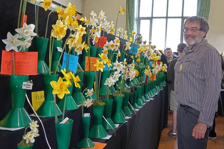 Bere Ferrers Flower Show committee member Clive Charlton with some of the many entries. Photo by Ann Parsons.
