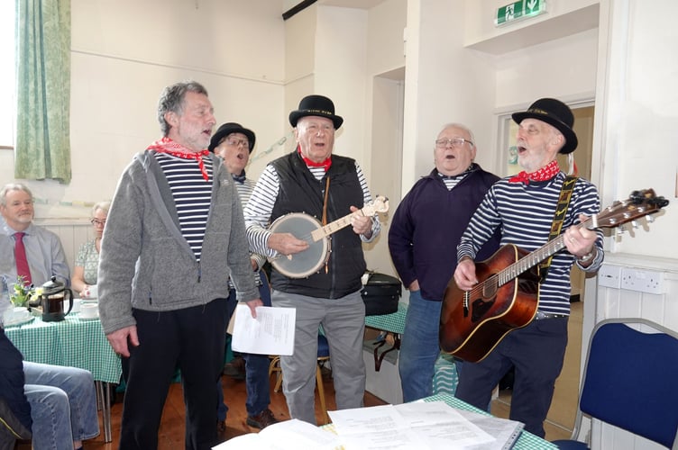 The Tavy Tars entertain at the 20-year anniversary celebrations of the Bere Ferrers Community Shop in the church hall. Photo by Ann Parsons.