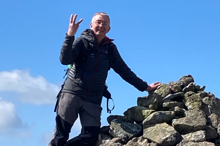 Joe Benjamin-Guest, 32, of Liddaton, is running seven daily marathons in a week to support his seriously ill family friend Steve Hemmings (pictured on one of his many Dartmoor tor climbs).