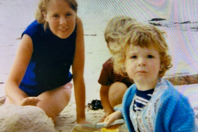 Fenella Haffenden, born profoundly deaf, pictured (right) on holiday as a young girl. 