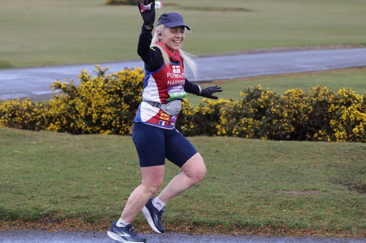 Smiling through the pain, a Plymouth Harriers runner looks forward to the Tavistock finish of the challenging Dartmoor Marathon which returned on Sunday, April 12, after a 40-year absence. Picture by Chris Cottrell.