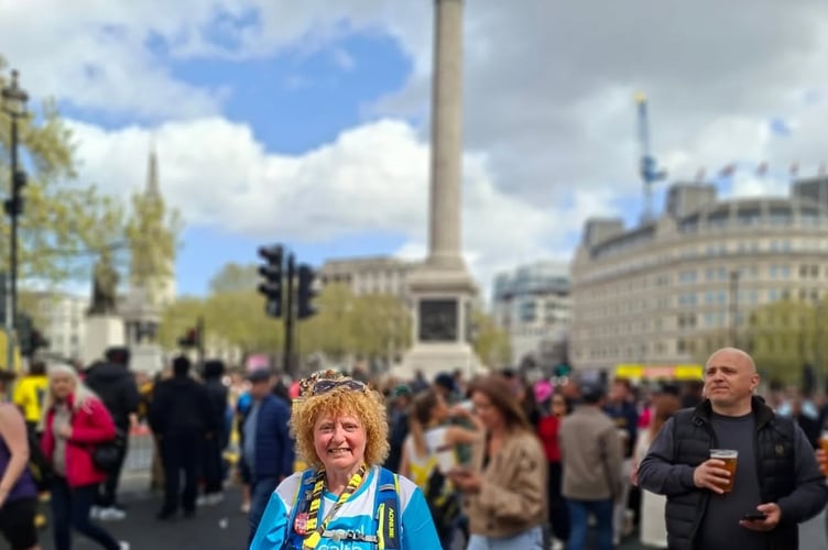 Dotty King, in front of Nelson's Column: Hot and tired, but happy Dotty and friends Emma Williams and Denise Bettey raised funds for mental health support by completing the London Landmarks Half Marathon (which is full of iconic buildings and statues) last Sunday, April 12.