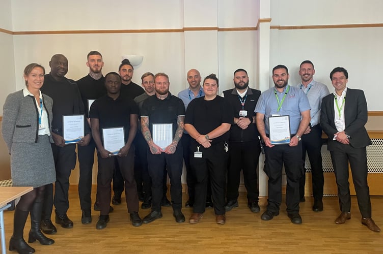 The Derriford security team with their certificates