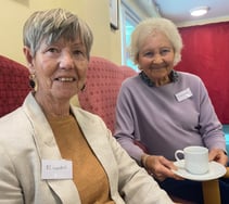 Group extends the hand of friendship