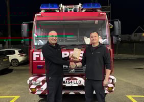 It is the end of an era for veteran Yelverton firefighter Mark Newton, but his legacy lives on through his son Alex, pictured right presenting his dad with a retirement plaque.