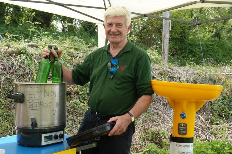 Bere Ferrers Orchard opening with Peter Wright giving advice on apple juice and cider making. Picture by Ann Parsons.