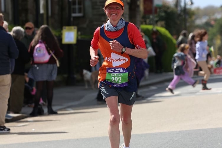 Amanda McOwan White finishes the hilly Dartmoor Marathon in Tavistock in tribute to her family members.