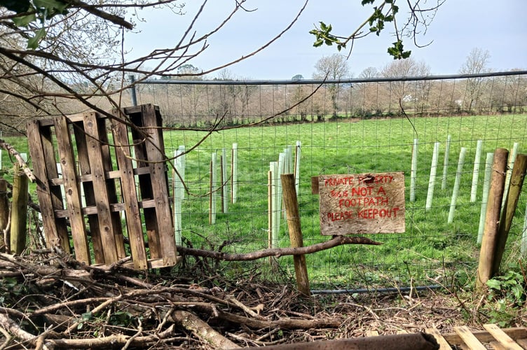 The current sign on the closed footpath.