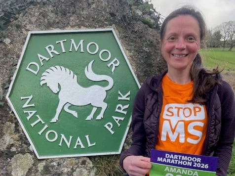 Amanda McGowan White dressed in her MS charity vest for which she completed the tough Dartmoor Marathon in tribute to family members.