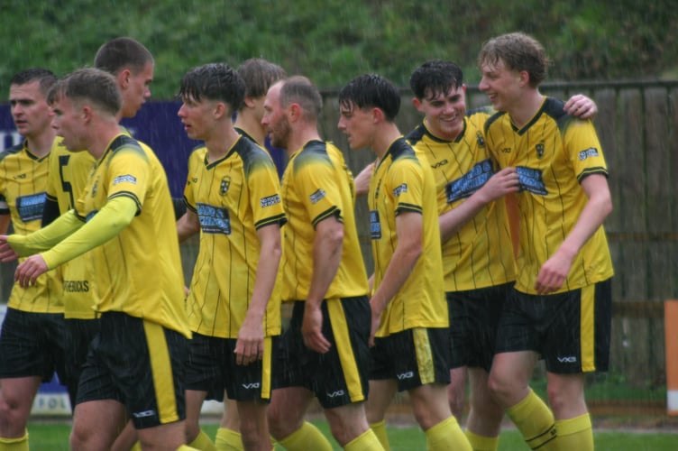 Buckland 2s players celebrate PJ Sharples' early goal.