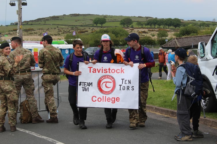 A triumphant Tavistock College 2026 Ten Tors team celebrate conquering the hills.