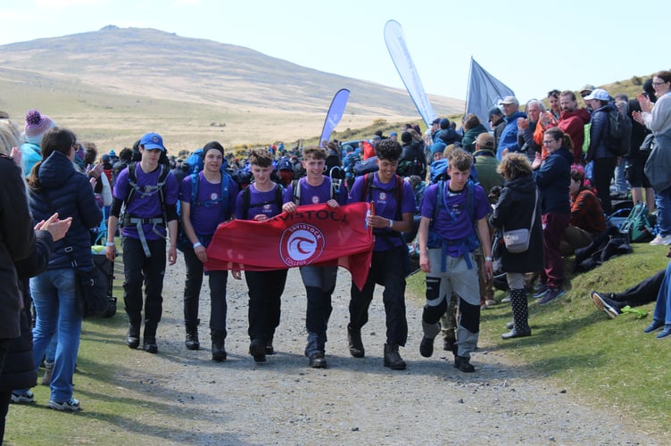 A triumphant Tavistock College 2026 Ten Tors team celebrate conquering the hills.