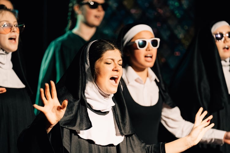 Evie Highet as Deloris Van Cartier in Sister Act