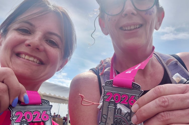 TAC Sarah Turner and Hannah Creasy with medals