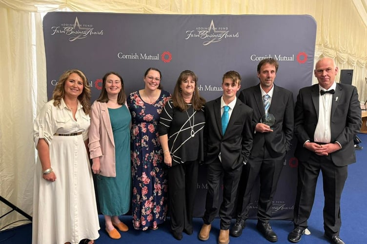 Harling's Farm owners the Richardson family were standout award winners at the Devon County Show's Devon Farming Awards. Pictured are mum Abbie, son Daniel and dad Will (fourth, fifth and sixth from left). Picture by Addington Fund.