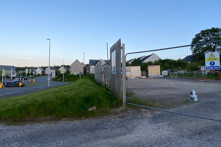 The site allocated for a shop at Minerva Way near Crediton Road