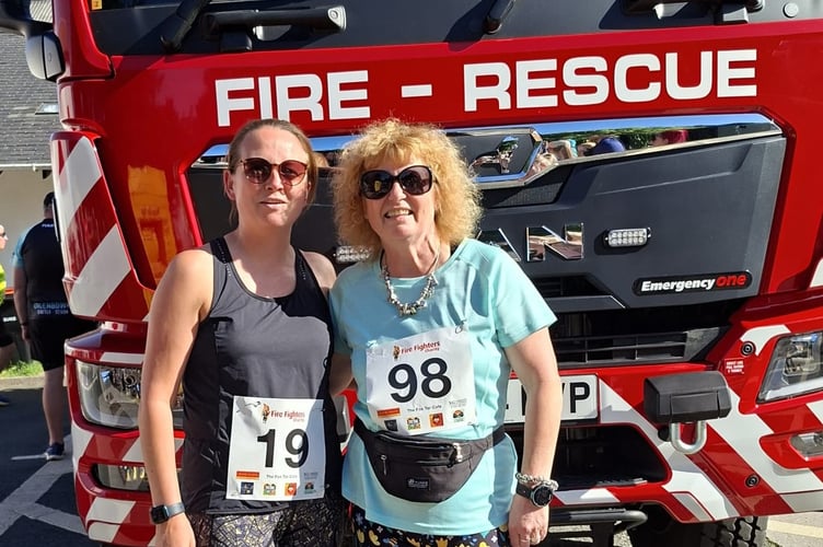 Tavistock trader and running coach Dotty King with her running friend Denise Bettey before the Princetown Fire Station 10km in aid of the Fire Fighters Charity.