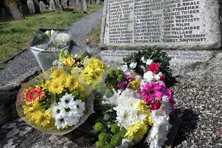 Flowers were laid on the war memorial at All Saints Parish Church, Okehampton in memory of Lt Cdr Gayson, Lt Fisher and Petty Officer Green.