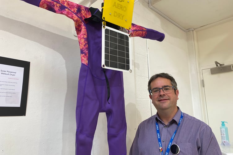 Sam Lawrence, Mount Kelly College design and technology teacher, with an A-level exam piece aimed at drying out wetsuits.