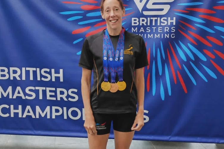 Tavistock Swimming Club's Sam Lake with her impressive two British Masters Championship title golds and a bronze.