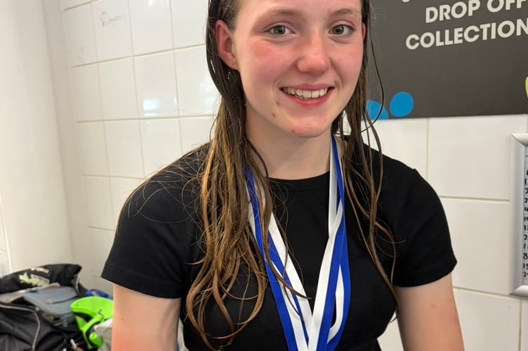 Tavistock Swimming Club's Mary Brogden with her gold at Devon ASA sprint meet.