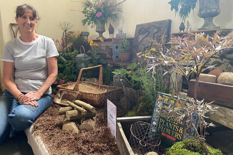 Angie Williamson, Milton Abbot Church Flower Show organiser, on her own allotment-themed display.