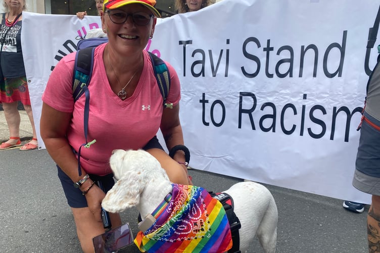 A pet dog and owner standing up to racism at TaviPride street parade.