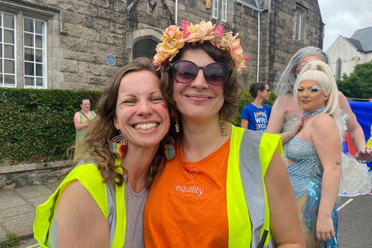 Julu and Heg, organisers of TaviPride, head the town centre parade.