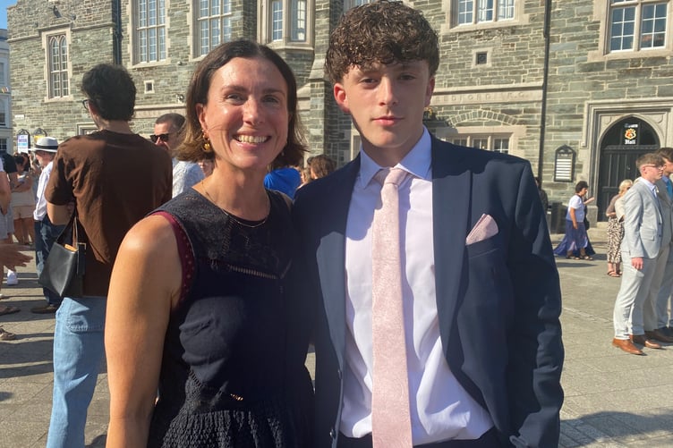Proud mum Paula Symons with student son Seth celebrating the end of exams and school with hundreds of families and classmates in Tavistock's Bedford Square for Tavistock College pre-proms gathering.