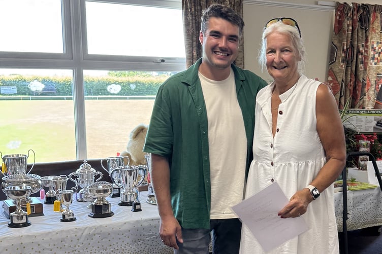 Loraine Evens' gardening skills wins her a prize at Bere Alston Flower and Produce Show.