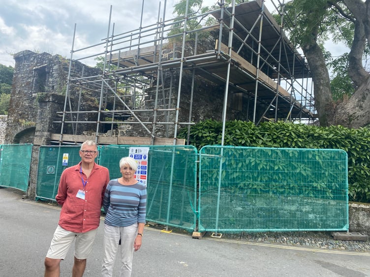 Historians Sue Spackman and David Conn of Tavistock Heritage Trust in front of Betsy Grimbal's Tower, now being restored.