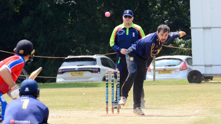 Tavistock's Billy Barriball bowling against Paignton in the Tiflex Devon Cup sem-final at Cornwood