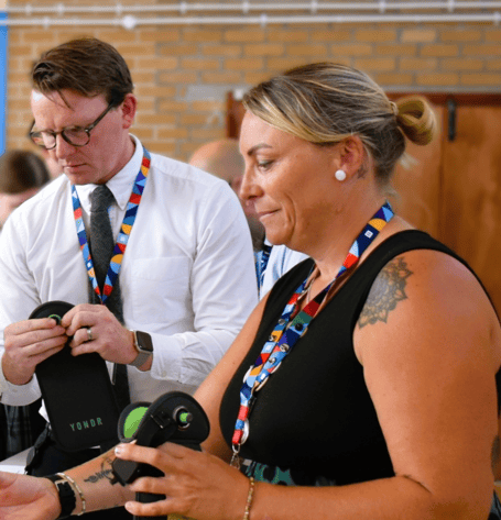 Tavistock College Principal James Buchanan and Rachel Shaw, Dartmoor Multi Academy Trust chief executive officer with the pouches used for the mobile-free school days.