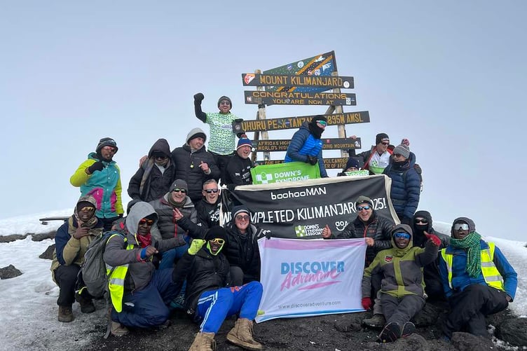 Darren Warkcup and his adventurous team reach Mount Kilimanjaro in aid of The Down's Syndrome Association.