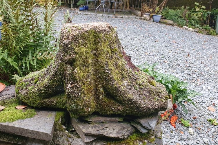 A granite pillar fluted top from the former grand Tavistock Abbey sits on a driveway of a private house in the town.