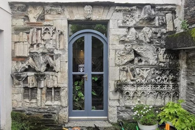 Local residents are being asked to turn history detectives in their homes and gardens to help uncover the remains of the former Tavistock Abbey. Pictured is a remarkable piece of carved abbey stonework on a Plymouth Road house.