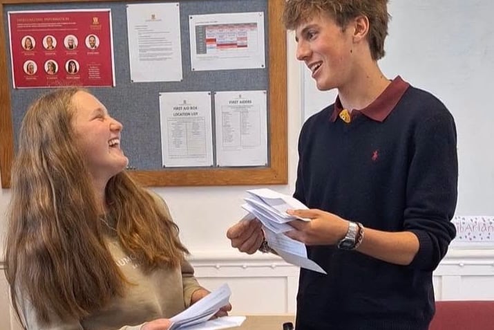 Tichy Sanders and Dylan Ferrigni-Monfils celebrate their results.