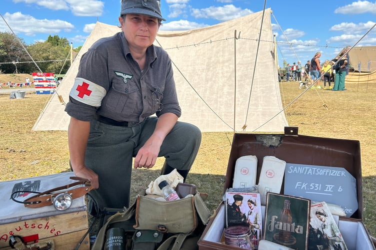 Re-enactor Nickie Bessant was telling the story of World War Two from the point of view of the German Red Cross. She made much of her replica kit herself.