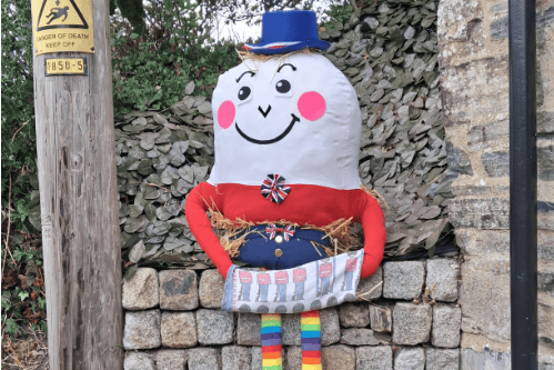 A Humpty Dumpty scarecrow on display at Lydford.