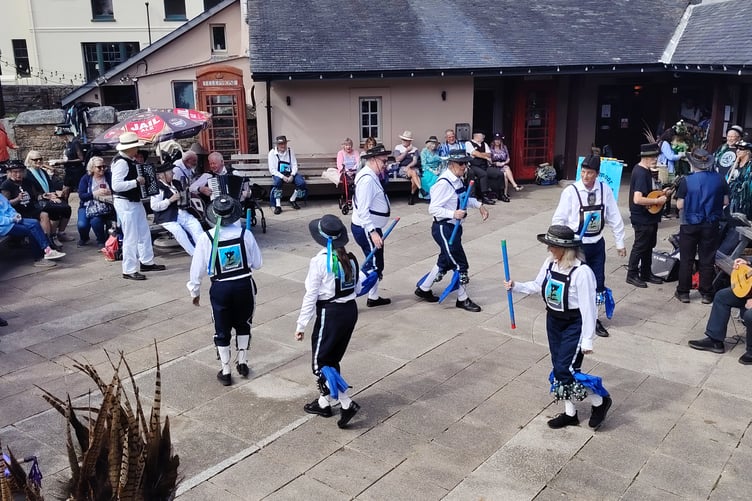 Morris dancers jingled and jigged at Princetown celebrations marking Border Morris quarter century celebrations.