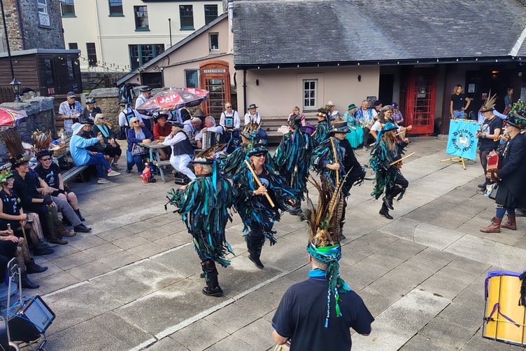 Entertaining the crowds at the Plume of Feathers pub for the Princetown celebrations marking the Border Morris group's quarter century.
