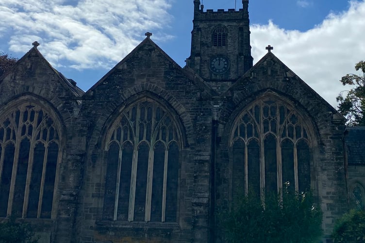 Tavistock's town centre St Eustachius' Church is causing passers-by to think the town is stuck in time as the tower clock hands have been stuck on 12 for the past two weeks or more.