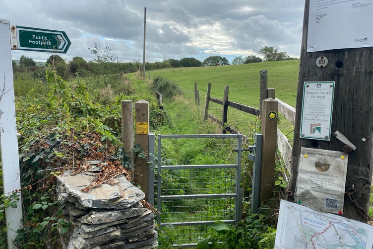 Bere Peninsula walkers are worried a village footpath closure will be extended due to delays in mending a septic tank. The path entrance and closure notice is pictured.
