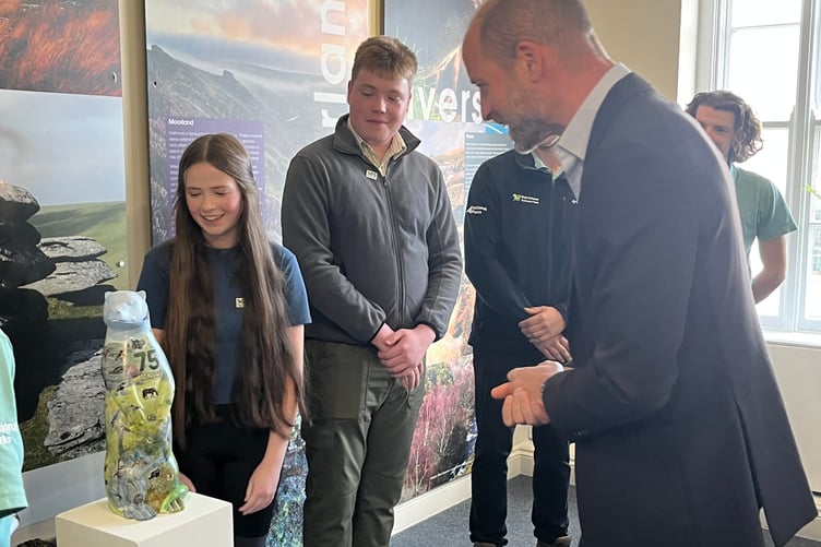 Prince William encounters a 'moor otter' at the new Gather and Moor centre in Princetown.