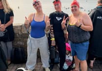 Tavistock leisure centre staff swim to island for charity