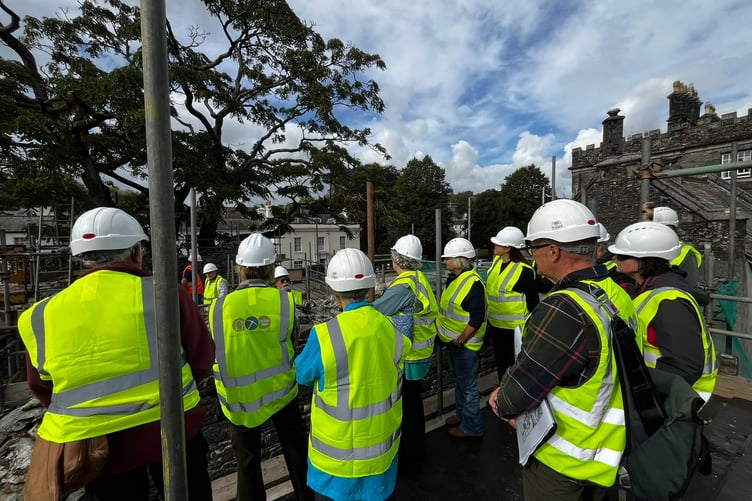 A Tavistock Heritage Open Days group of visitors on top of the Betsy Grimbal Tower seeing the restoration.