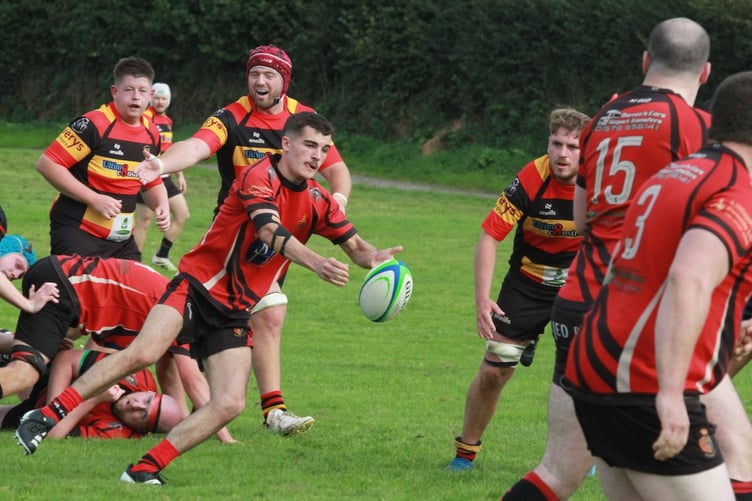 Tavistock's No.9 Oscar Slater moves it on